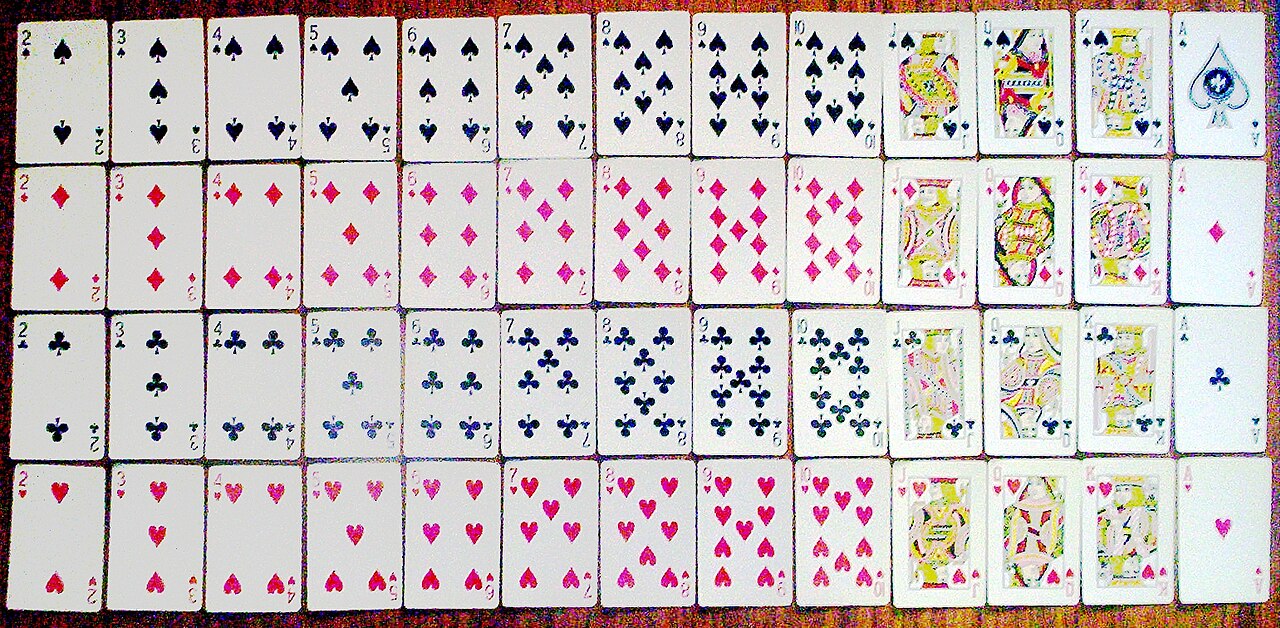 A complete set of 52 playing cards